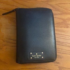 kate spade black leather zip around planner.